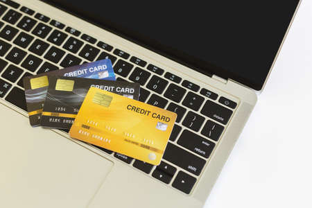 Close Up, Credit card banks on keyboard laptop used for online shopping.,business concept.