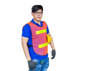Asian man engineer wearing safety jacket with yellow helmet isolated on white background.の写真素材