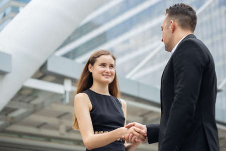Business people shaking hand together.の写真素材