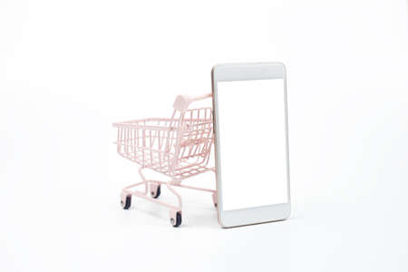 Smartphone empty white screen mockup use for text advertising with shopping cart on white...