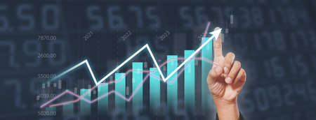 Index finger touch pointing trading graph, â€‹Stock exchange marketing analyzing chart....