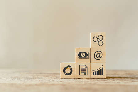 stack wooden block with business icon. management marketing concept.の写真素材