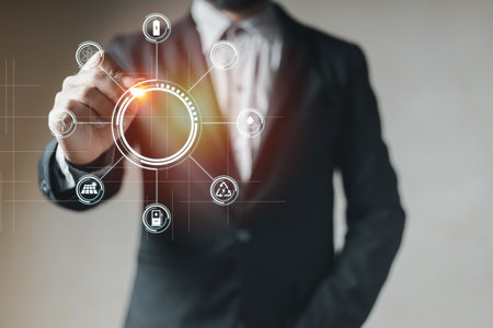 Business energy power concept. Businessman pointing  button energy power electric icons. modern electronic innovation industry technology generation.の写真素材