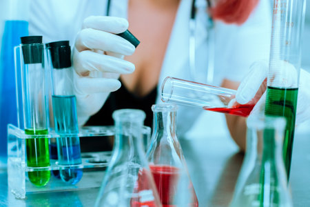 Close up selective focus at Test tubes chemical analysis, research and test chemical with test tubes in laboratory.の写真素材