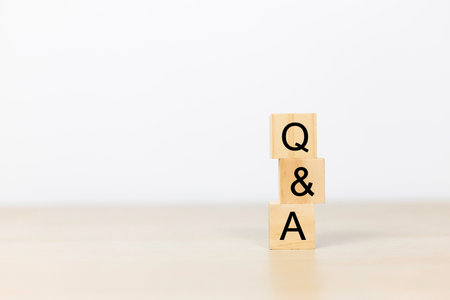 Question and Answer Concept. wooden block cube with text Q and A. communication informationの写真素材