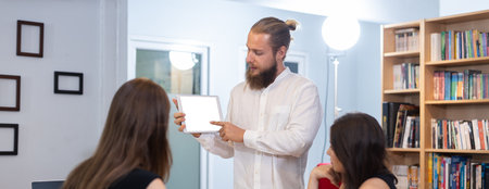 Group of business people brainstorming report analyze work goal graph at table office with tablet white screen. Effective people in organization use idea to consult their work.の写真素材