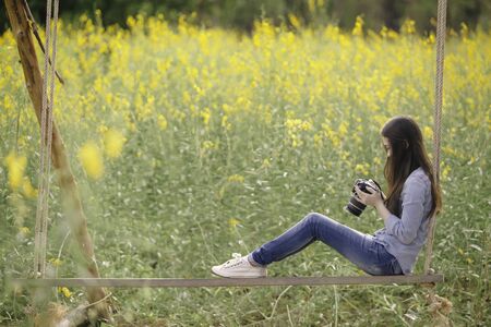 Traveler take a photo in Crotalaria Fields, Songkhla, Thailandの写真素材