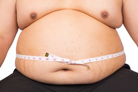 Fat man Stomach Of An Obese Man isolated on white background.の写真素材