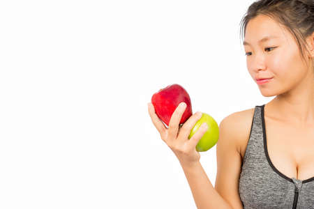 Woman eating healthy fruits ,  Dieting concept. Healthy food ,white background isolateの写真素材