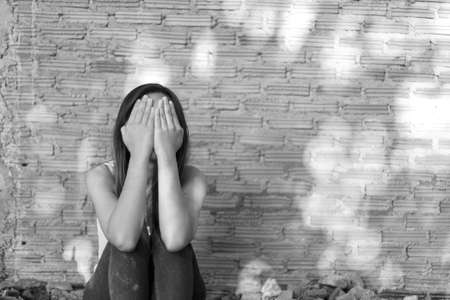 Woman bondage in angle of abandoned building , stop violence against Women, international women's dayの写真素材