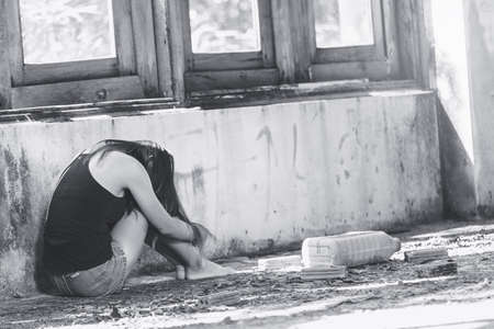 Woman bondage in angle of abandoned building image blur , stop violence against Women, international women's dayの写真素材