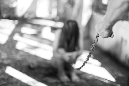 Woman bondage in angle of abandoned building image blur , stop violence against Women, international women's dayの写真素材
