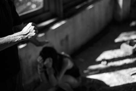 Woman bondage in angle of abandoned building image blur , stop violence against Women, international women's dayの写真素材