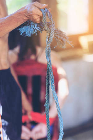 Woman bondage in angle of abandoned building image blur , stop violence against Women, international women's dayの写真素材