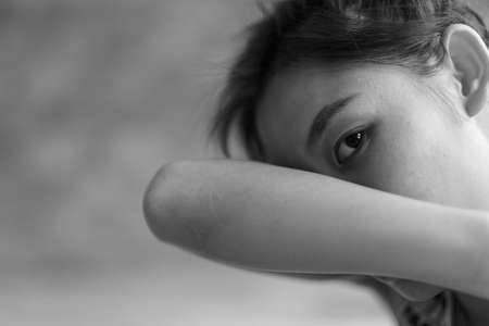 Emotional portrait of abused, crying,- violence conceptの写真素材