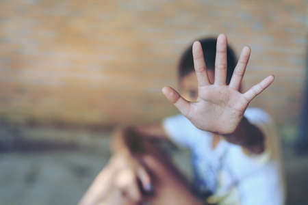 Stop emotional stress and pain, afraid, restricted, trapped, call for help, struggle, terrified, violence, slave, Human Rights Day concept.の写真素材