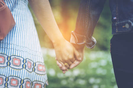 Couples holding handsの写真素材