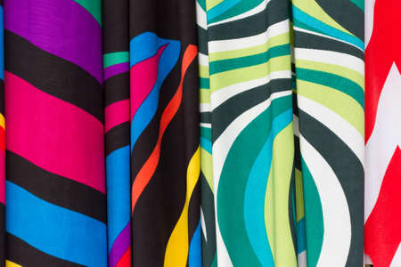 Different colorful fabrics on the marketの写真素材
