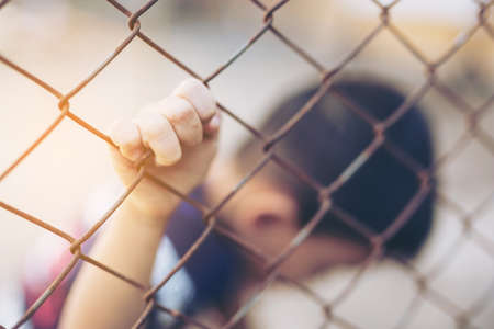 Stop abusing boy violence. child bondage in angle image blur , Human Rights Day concept.の写真素材
