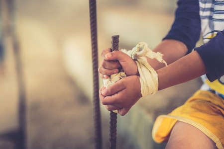 Stop abusing boy violence. child bondage in angle image blur , Human Rights Day concept.の写真素材