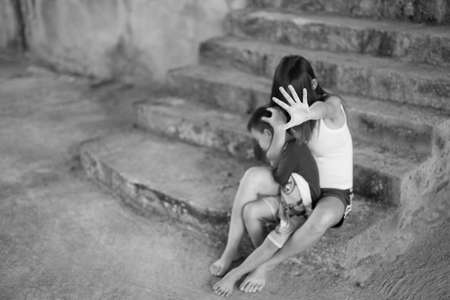 Woman bondage in angle of abandoned building , stop violence against Women, international women's dayの写真素材