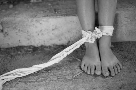 Woman bondage in angle of abandoned building , stop violence against Women, international women's...