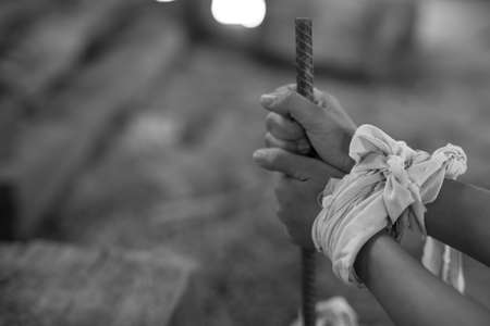 Woman bondage in angle of abandoned building , stop violence against Women, international women's dayの写真素材