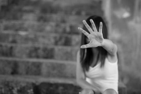 Woman bondage in angle of abandoned building , stop violence against Women, international women's dayの写真素材