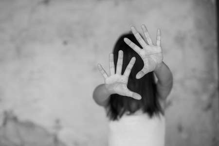 Woman bondage in angle of abandoned building , stop violence against Women, international women's dayの写真素材