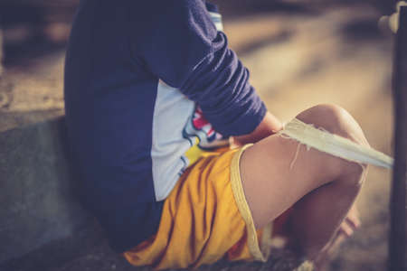 Stop abusing boy violence. child bondage in angle image blur , Human Rights Day concept.の写真素材