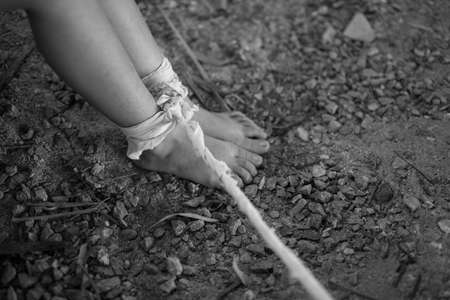 Woman bondage in angle of abandoned building , stop violence against Women, international women's...