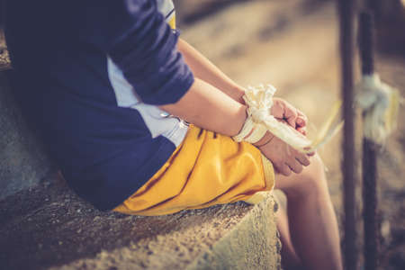 Stop abusing boy violence. child bondage in angle image blur , Human Rights Day concept.の写真素材