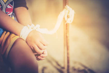 Stop abusing boy violence. child bondage in angle image blur , Human Rights Day concept.の写真素材