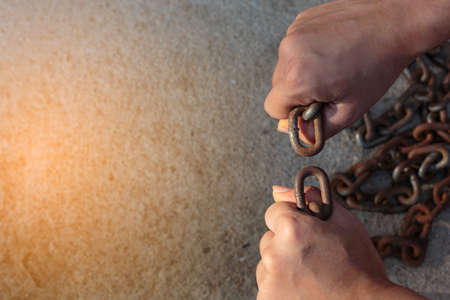 vintage tone of Shot focus of hand of Woman Liberation from the chainsの写真素材