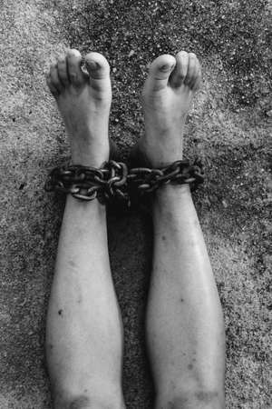 vintage tone of Shot focus of  Foot of Woman  chainedの写真素材