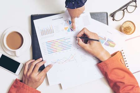 Top view of business team meeting or discussing documentsの写真素材