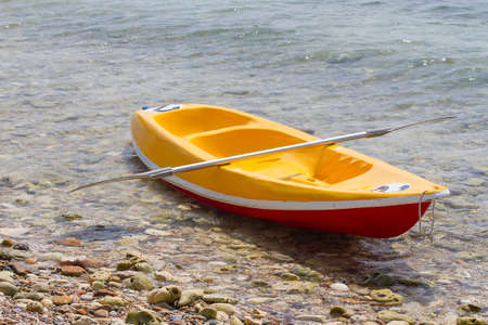 Rawboat on the waterの写真素材