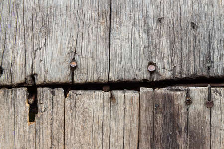 wood texture with iron screwの写真素材