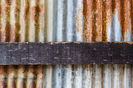 Rusty galvanized iron plate with wood old surface, texture, Background ,Selective focusの写真素材