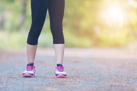 young fitness woman legs runningの写真素材