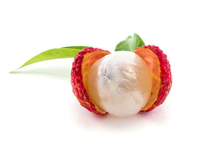 Sweet Lychees fruits with leaves close up isolated on white backgroundの写真素材