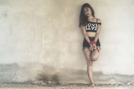 Women of a victim tied up with ropeの写真素材