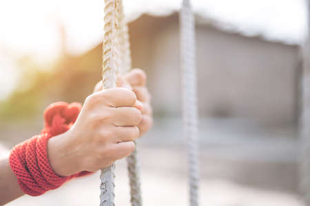 Women of a victim tied up with ropeの写真素材