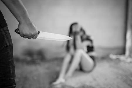 Woman victim of domestic violence and abuse image blur , stop violence against Women, international...