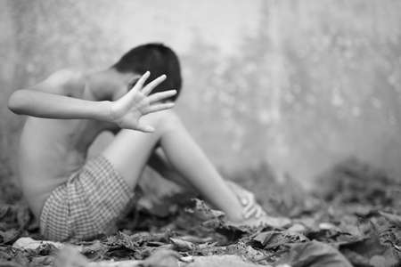 Stop abusing boy violence. child bondage in angle image blur , Human Rights Day concept.の写真素材