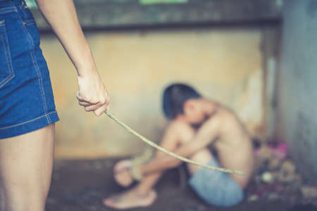 Stop abusing boy violence. child bondage in angle image blur , Human Rights Day concept.の写真素材