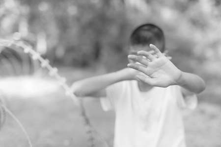 Stop abusing boy violence. child bondage in angle image blur , Human Rights Day concept.の写真素材