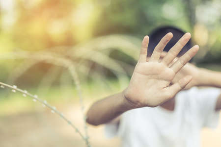 Stop abusing boy violence. child bondage in angle image blur , Human Rights Day concept.の写真素材