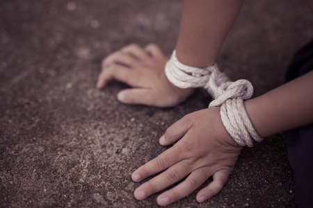 Stop abusing boy violence. child bondage , violence, terrified , A fearful child , Human Rights Day concept. の写真素材