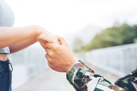 Young military couple kissing each other, homecoming concept,の写真素材